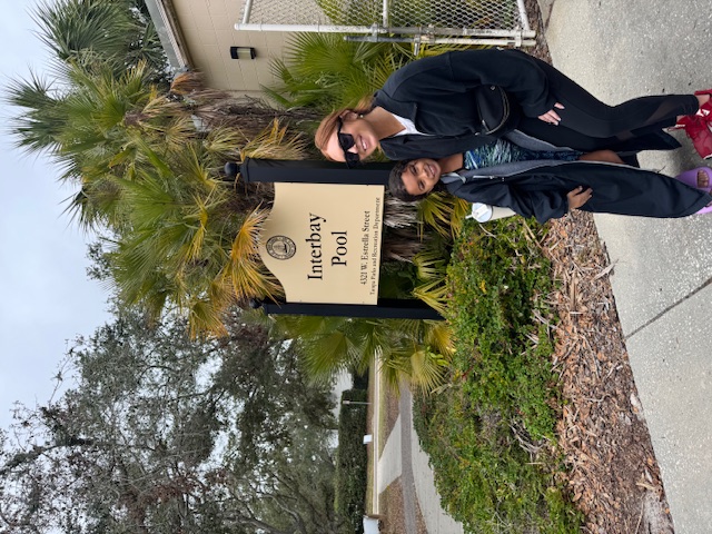 youth swimmer with coach image